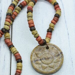 Red and Yellow Beaded Necklace with Rustic Pendant